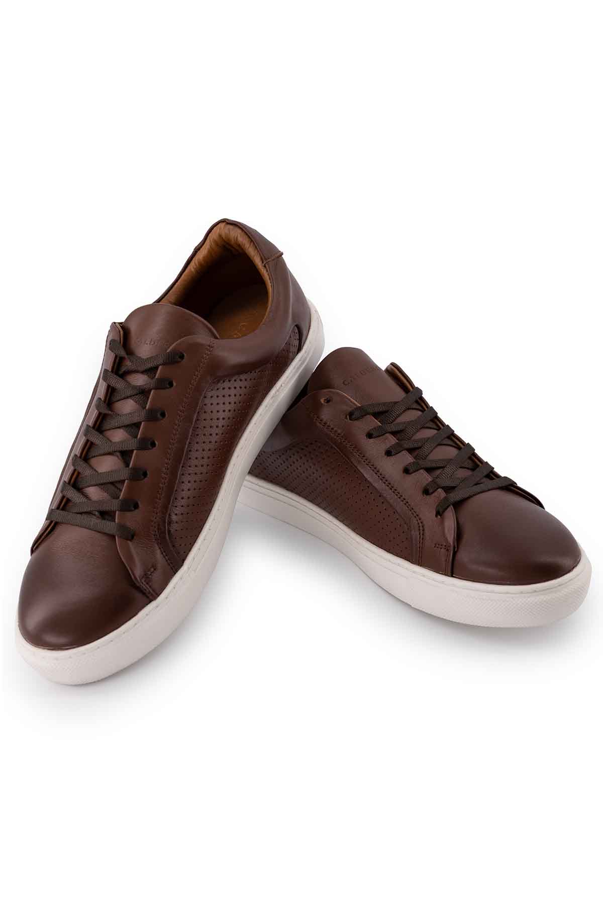Tenis Calderoni image number 3